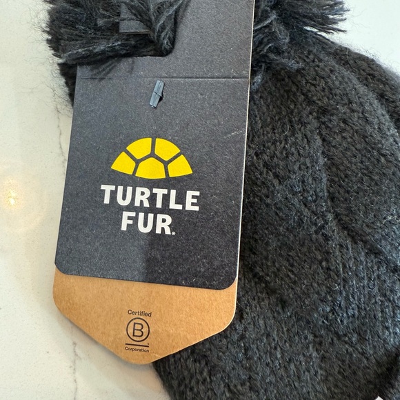 Turtle Fur Black Knit fleece lining and Pom-Pom Beanie adult size unisex
MWT - Picture 4 of 5